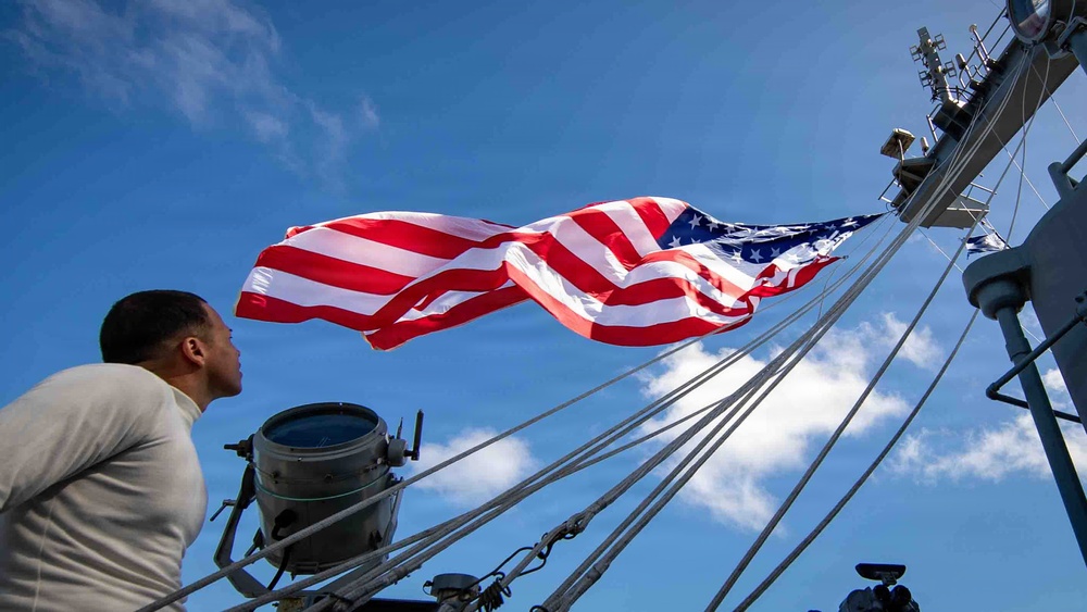 Battle Ensign Raised on USS George Washington Mast