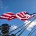 Battle Ensign Raised on USS George Washington Mast
