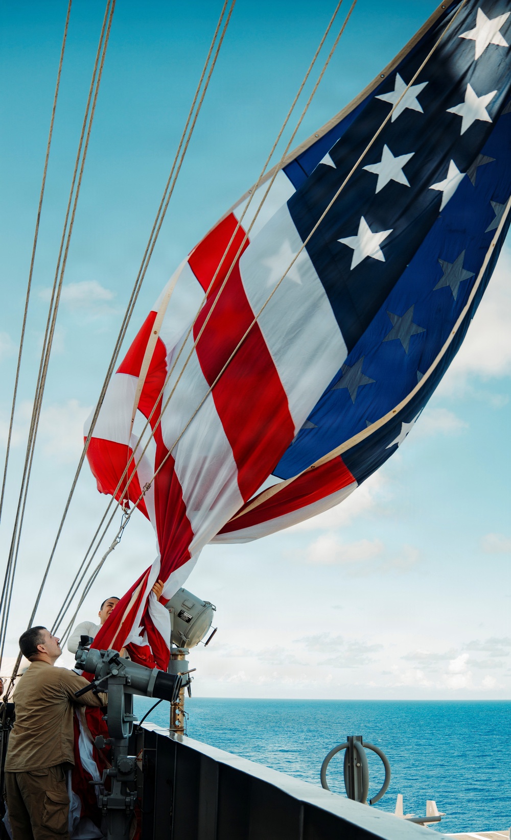 Battle Ensign Raised on USS George Washington Mast