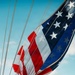 Battle Ensign Raised on USS George Washington Mast