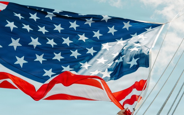 Battle Ensign Raised on USS George Washington Mast