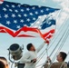 Battle Ensign Raised on USS George Washington Mast
