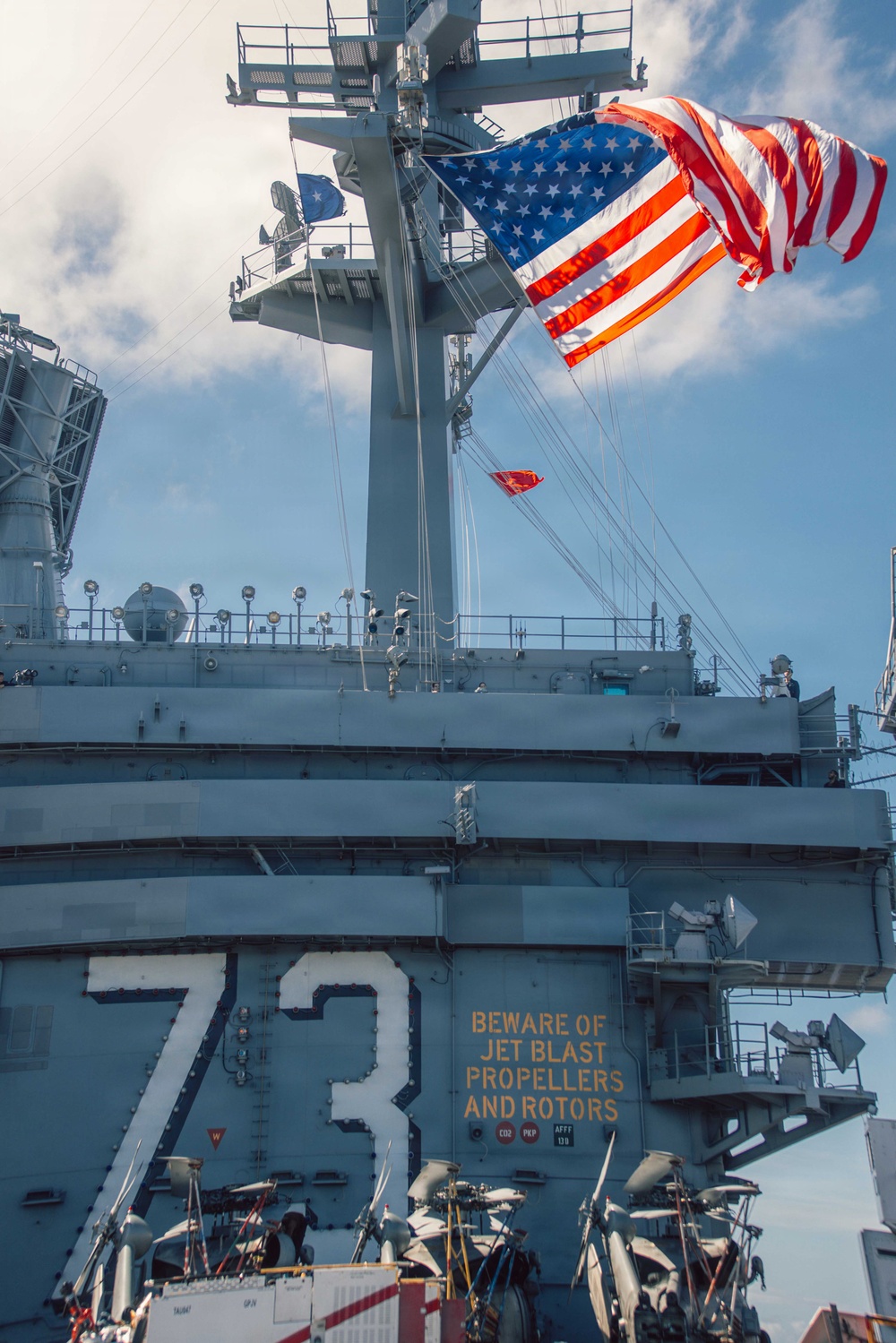 Battle Ensign Raised on USS George Washington Mast