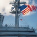 Battle Ensign Raised on USS George Washington Mast