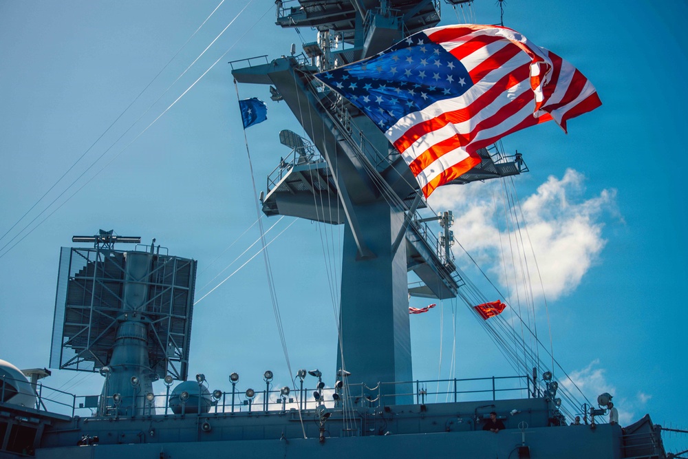Battle Ensign Raised on USS George Washington Mast
