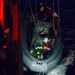Sailors Conduct Nighttime Small Boat Operations from Naval Vessel