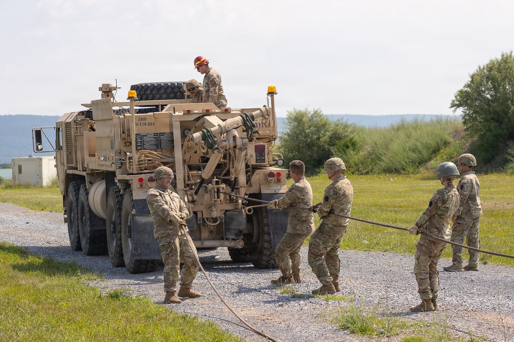1-112th Infantry Soldiers conduct recovery operations in mire pits