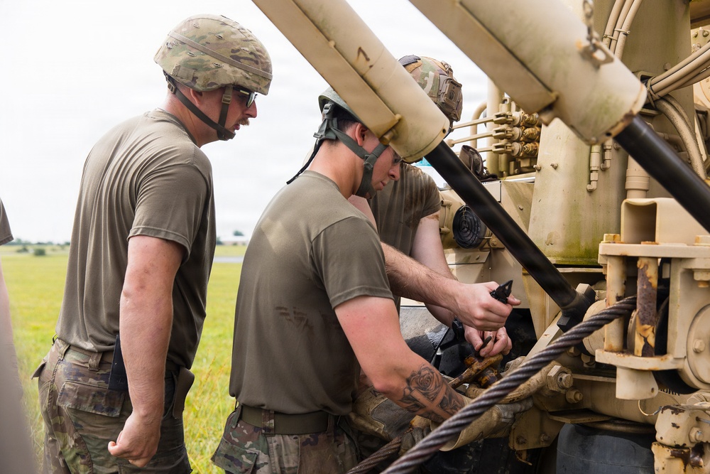 1-112th Infantry Soldiers conduct recovery operations in mire pits