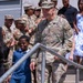 U.S. Army Gen. Christopher Donahue descends the steps of the Mission Command Center