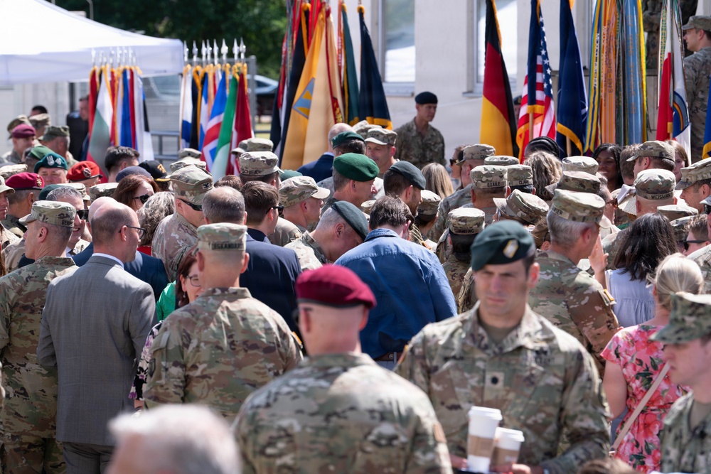 Soldiers and NATO Allies gather around Gen. Christopher Donahue after his relinquishment of Command.