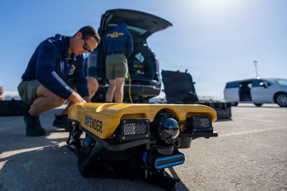 U.S. Coast Guard divers conduct safety inspections for Sail250