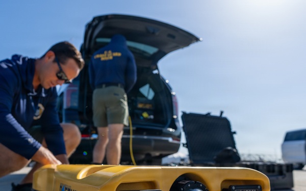 U.S. Coast Guard divers conduct safety inspections for Sail250