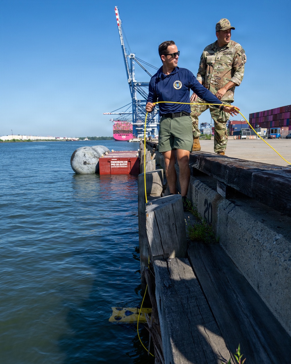 U.S. Coast Guard divers conduct safety inspections for Sail250