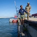 U.S. Coast Guard divers conduct safety inspections for Sail250