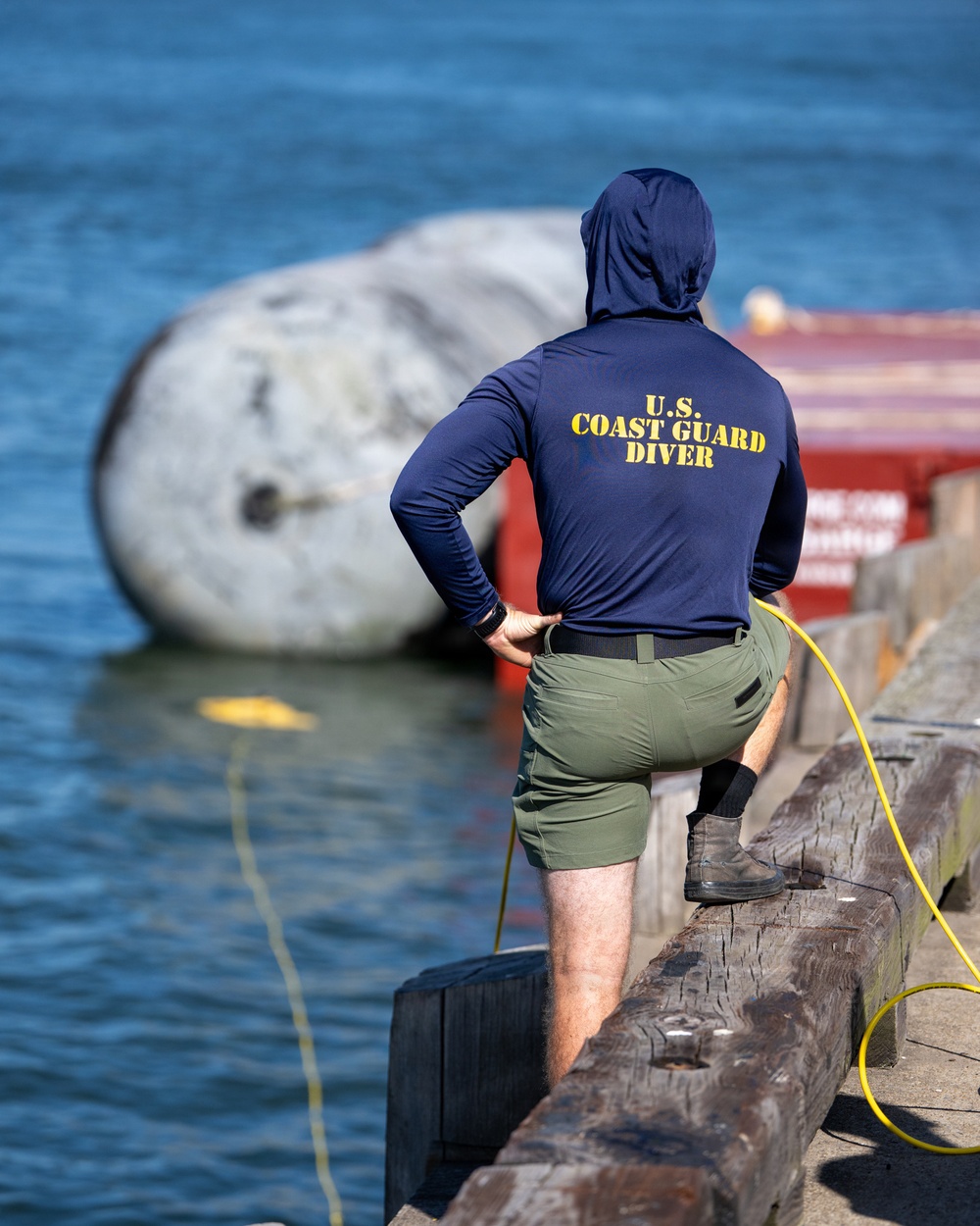 U.S. Coast Guard divers conduct safety inspections for Sail250