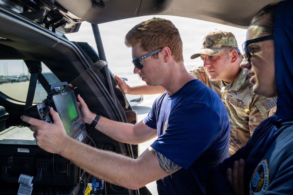 U.S. Coast Guard divers conduct safety inspections for Sail250