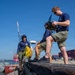 U.S. Coast Guard divers conduct safety inspections for Sail250