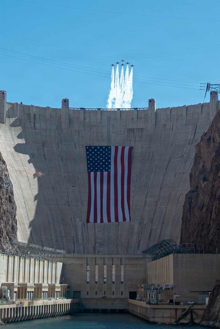 USAF Thunderbirds fly over Hoover Dam with historic American Flag