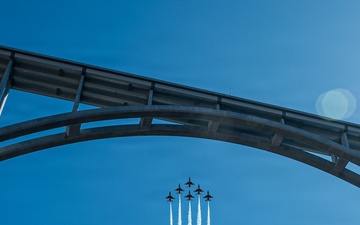 USAF Thunderbirds fly over Hoover Dam with historic American Flag