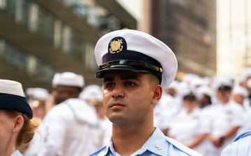 Coast Guard members assemble in Times Square during Sail 250