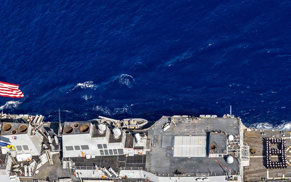 USS Mustin conducts a photo exercise in the Indian Ocean