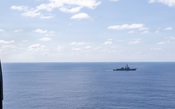 USS Mustin conducts a photo exercise in the Indian Ocean