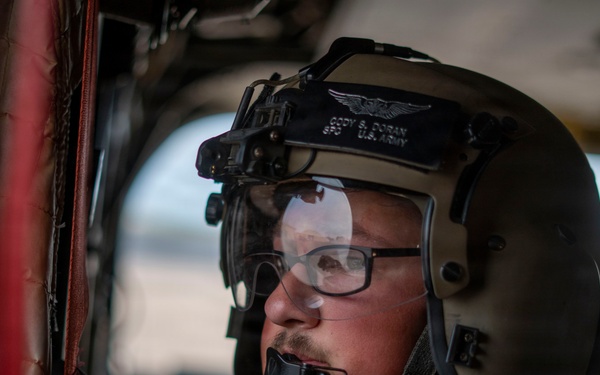 1st AD Combat Aviation Brigade and 62nd Engineer Battalion take off during sling load ops