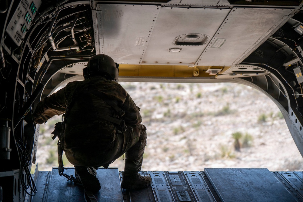 1st AD Combat Aviation Brigade and 62nd Engineer Battalion take off during sling load ops