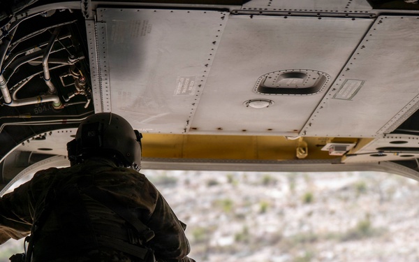 1st AD Combat Aviation Brigade and 62nd Engineer Battalion take off during sling load ops