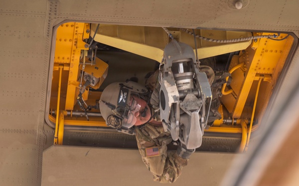 1st AD Combat Aviation Brigade and 62nd Engineer Battalion take off during sling load ops