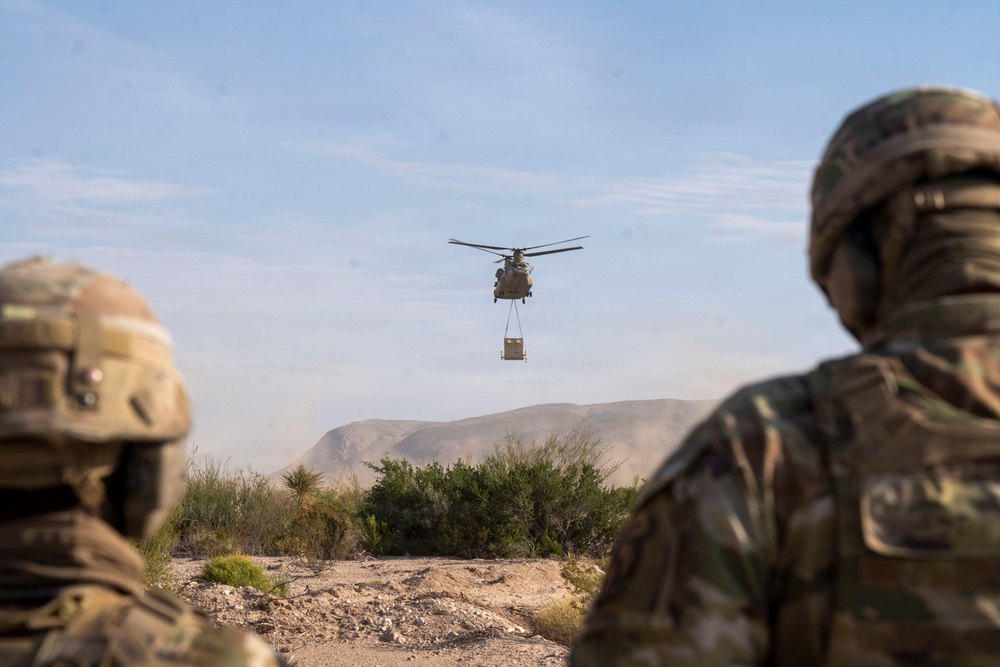 1st AD Combat Aviation Brigade and 62nd Engineer Battalion take off during sling load ops