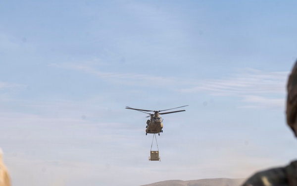 1st AD Combat Aviation Brigade and 62nd Engineer Battalion take off during sling load ops