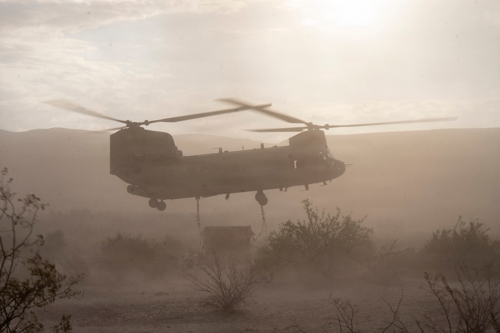 1st AD Combat Aviation Brigade and 62nd Engineer Battalion take off during sling load ops