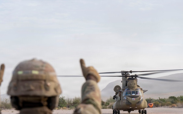 1st AD Combat Aviation Brigade and 62nd Engineer Battalion take off during sling load ops