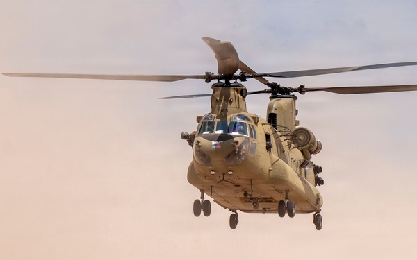 1st AD Combat Aviation Brigade and 62nd Engineer Battalion take off during sling load ops