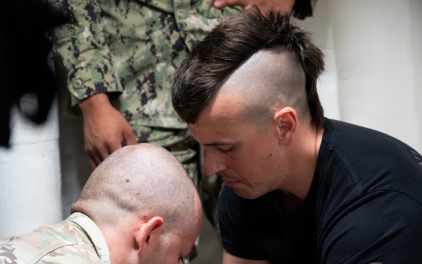 Partner nations participate in Tactical Combat Casualty Care training scenarios during RIMPAC 2026
