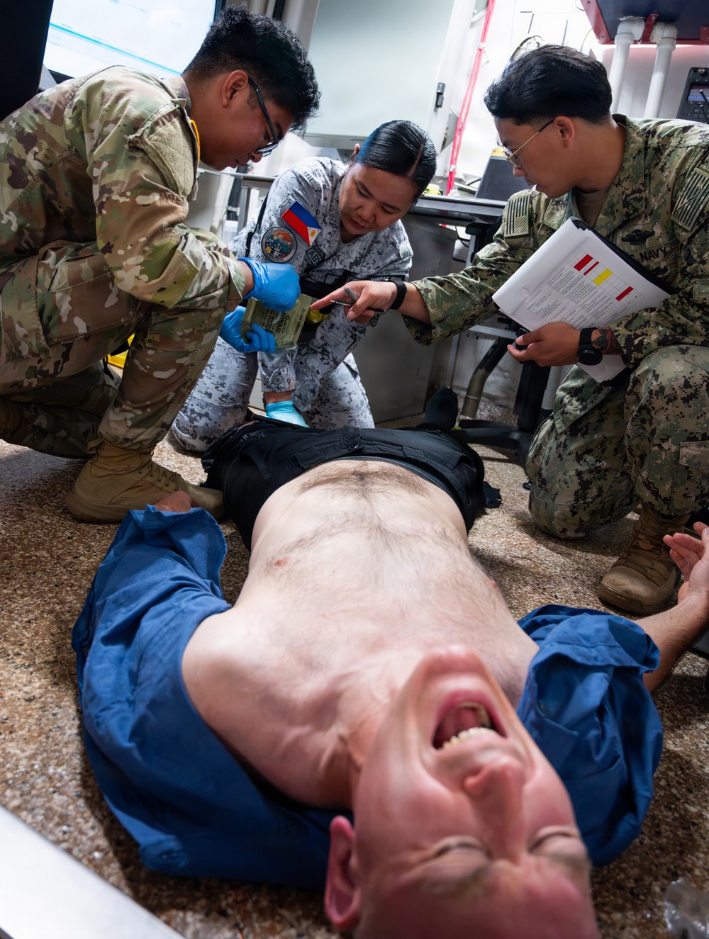 Partner nations participate in Tactical Combat Casualty Care training scenarios during RIMPAC 2026