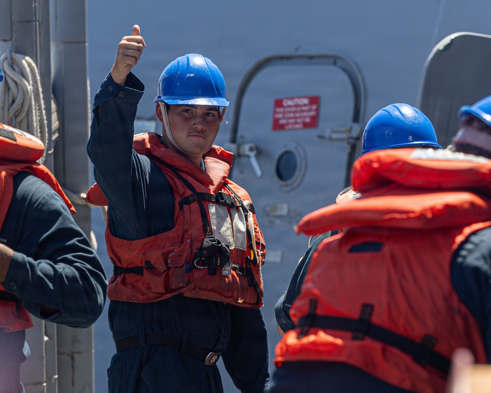 USS Mustin conducts boat operations