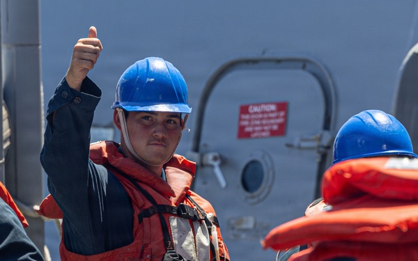USS Mustin conducts boat operations