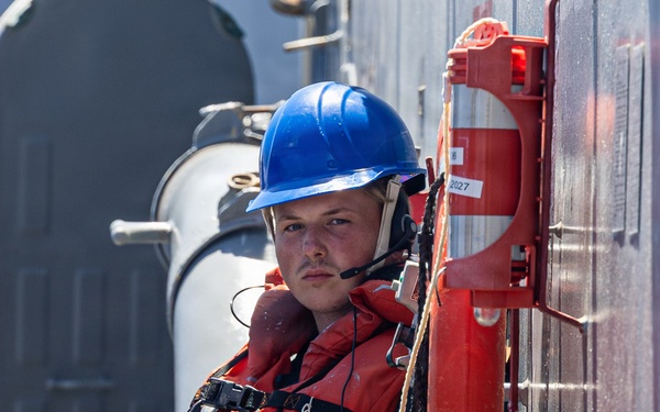 USS Mustin conducts boat operations