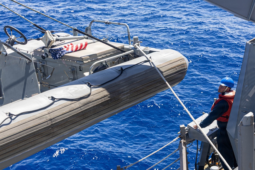 USS Mustin conducts boat operations