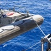 USS Mustin conducts boat operations