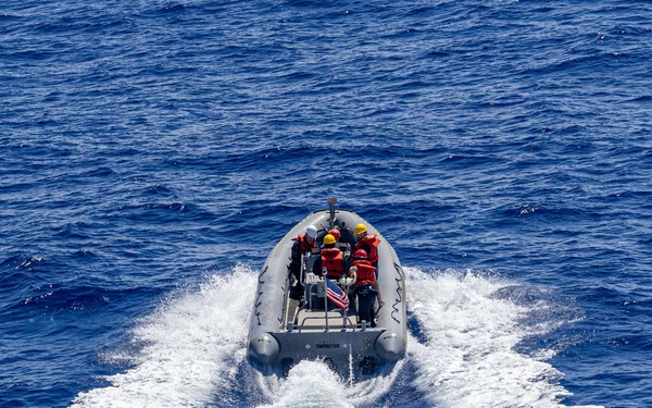 USS Mustin conducts boat operations