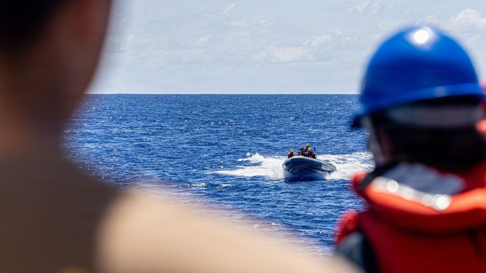 USS Mustin conducts boat operations