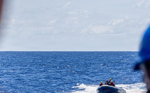 USS Mustin conducts boat operations
