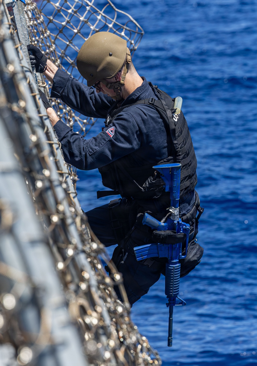 USS Mustin conducts boat operations
