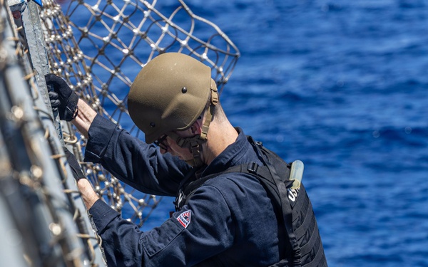 USS Mustin conducts boat operations