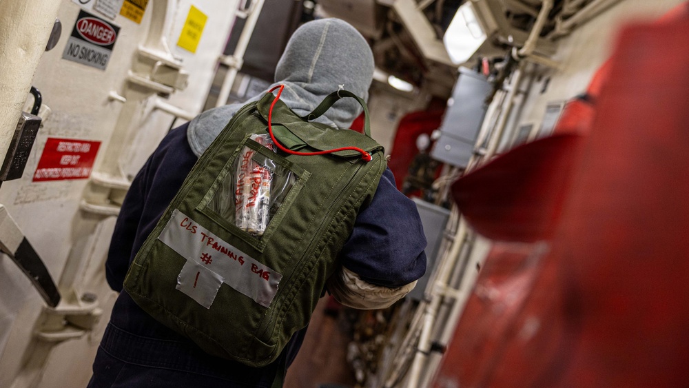 USS Mustin conducts an integrated training team drill