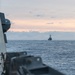 USS Mustin conducts a replenishment-at-sea with USNS Wally Schirra