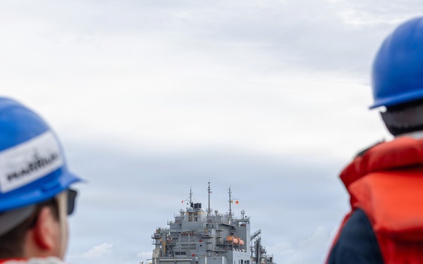 USS Mustin conducts a replenishment-at-sea with USNS Wally Schirra